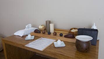 Relax in our serene spa, where a warm welcome awaits at the reception desk, complete with a soothing menu and refreshing amenities.