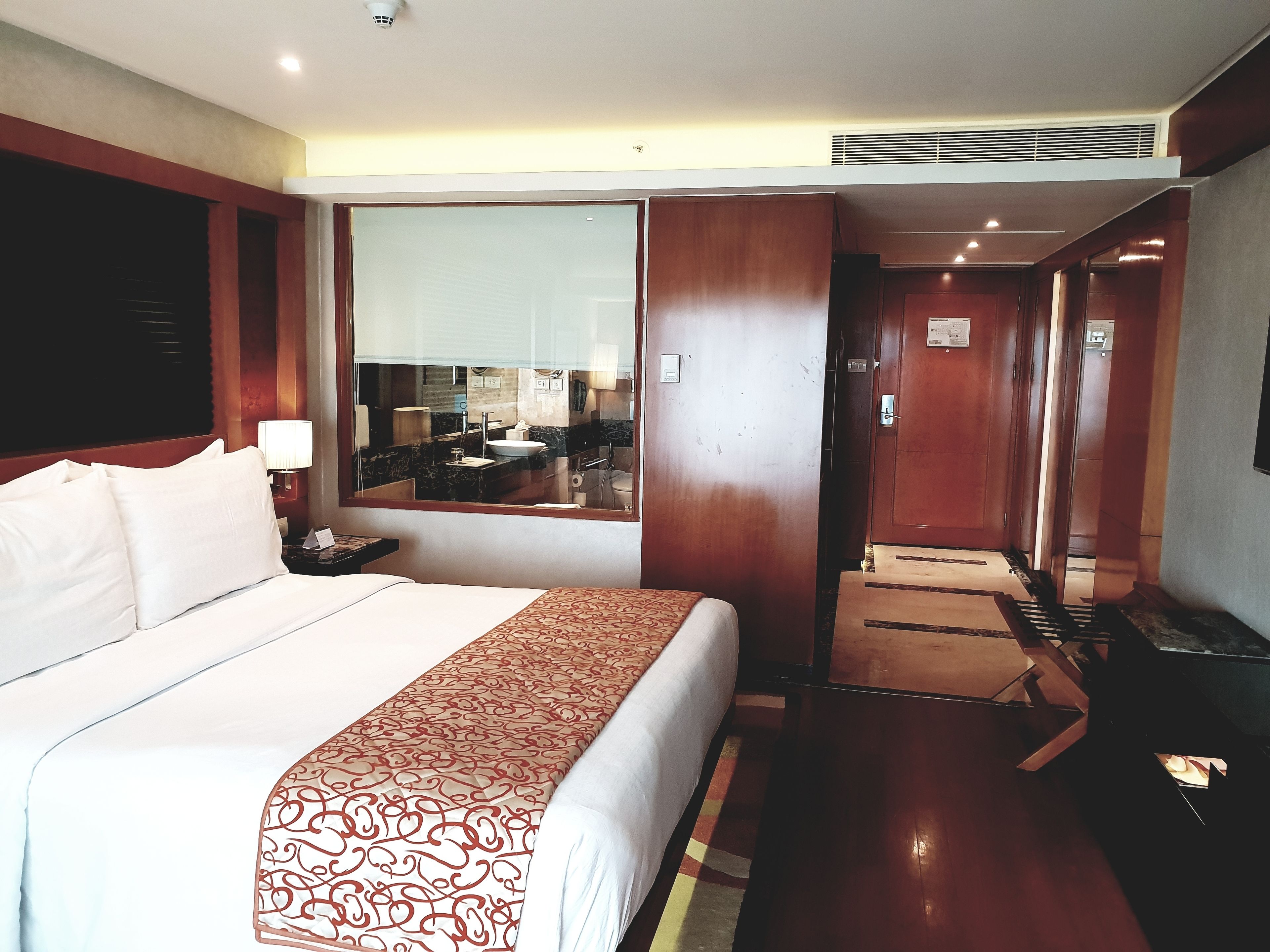 Premium bedding, down comforters, memory foam beds, minibar