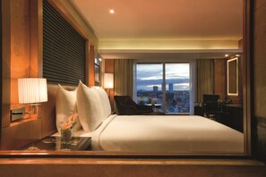 Premium bedding, down comforters, memory foam beds, minibar