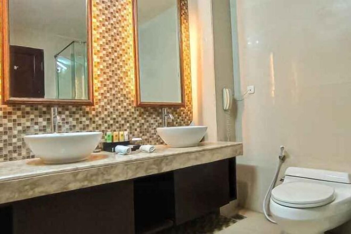 Bathroom | Shower, hair dryer, slippers, towels