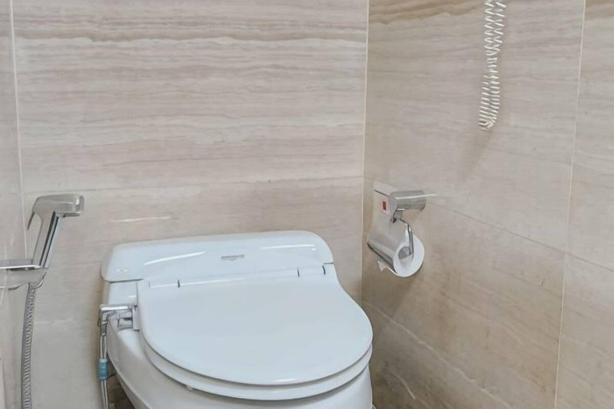 Bathroom | Shower, hair dryer, slippers, towels