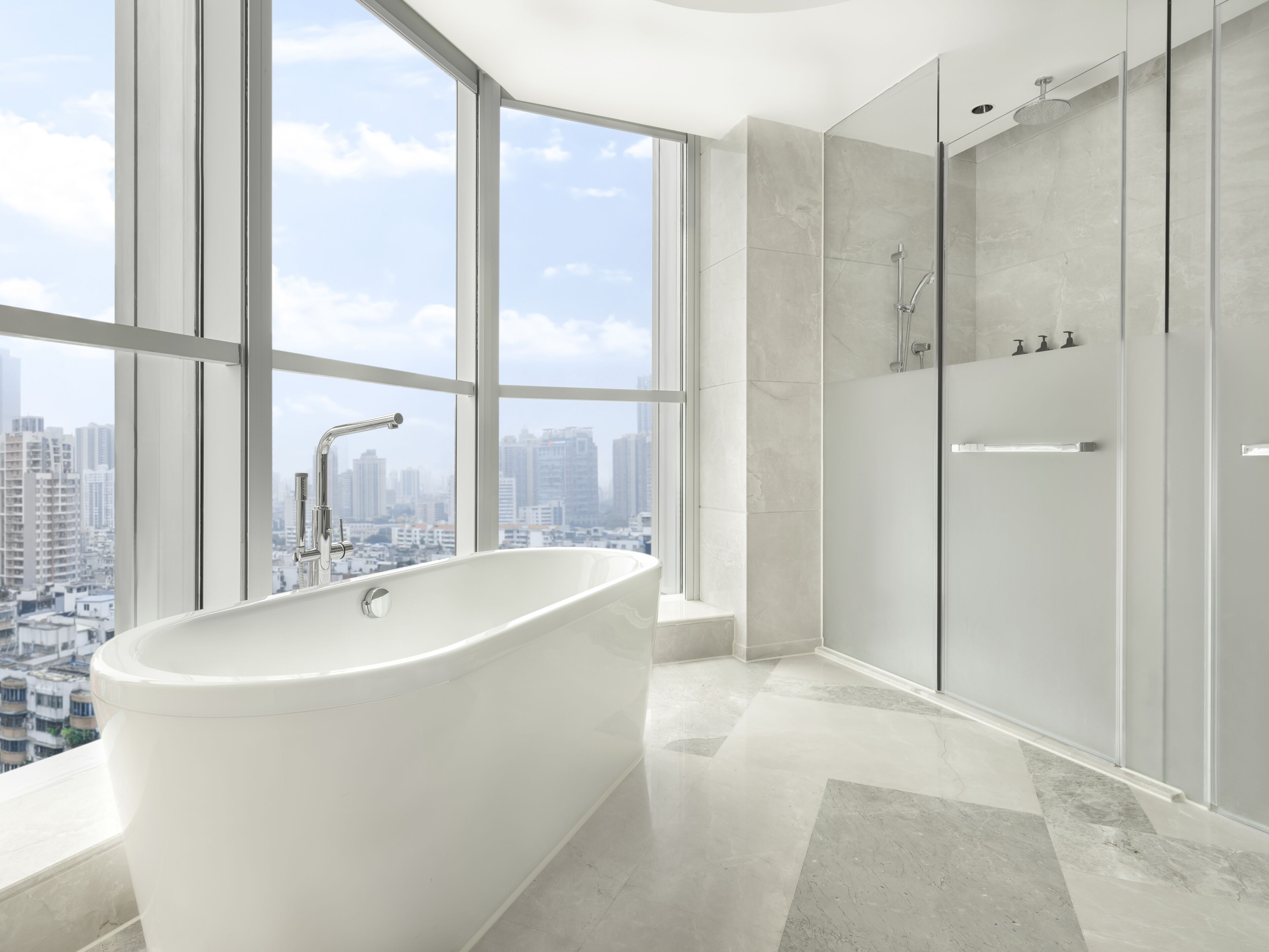 separate bathtub and shower, deep-soaking bathtub, rainfall showerhead