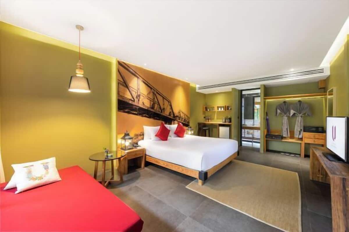 Luxe beddengoed, een minibar, een kluis op de kamer, een bureau