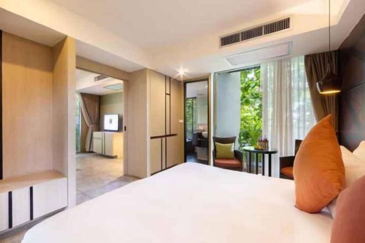 Luxe beddengoed, een minibar, een kluis op de kamer, een bureau