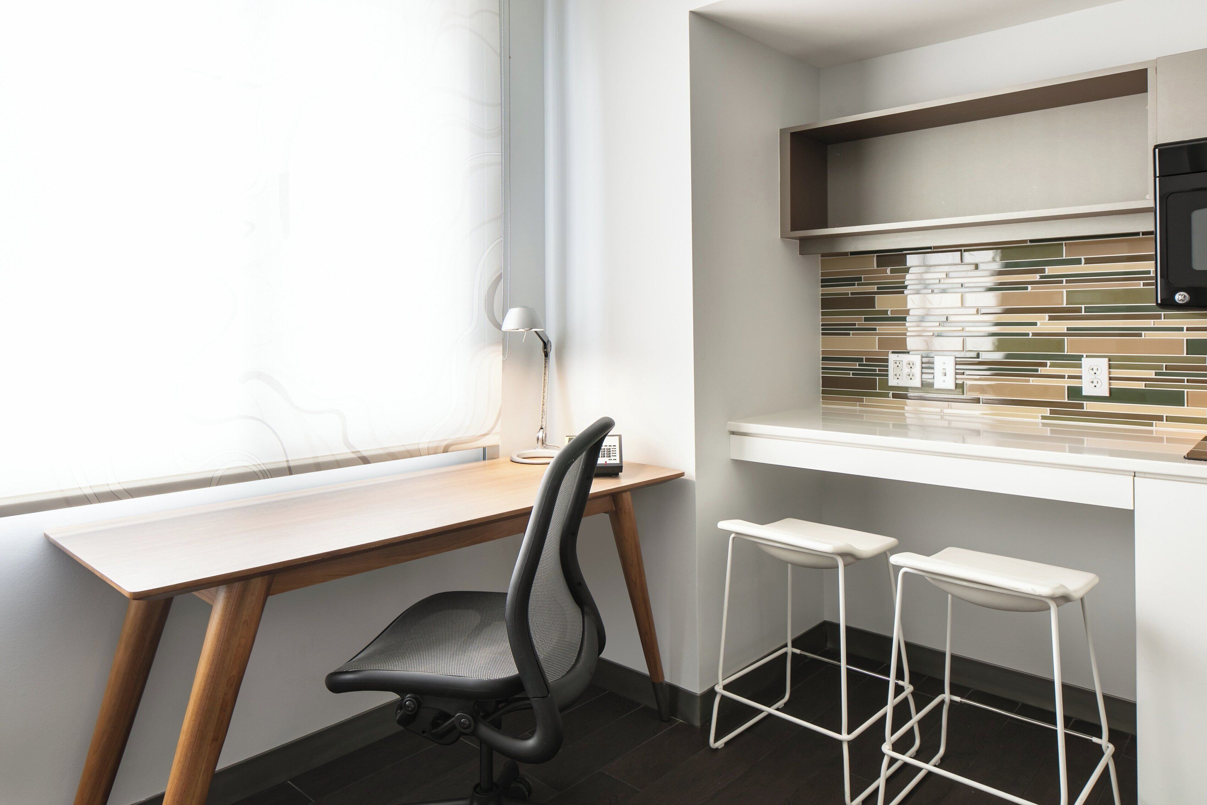 hypo-allergenic bedding, down duvets, in-room safe, desk