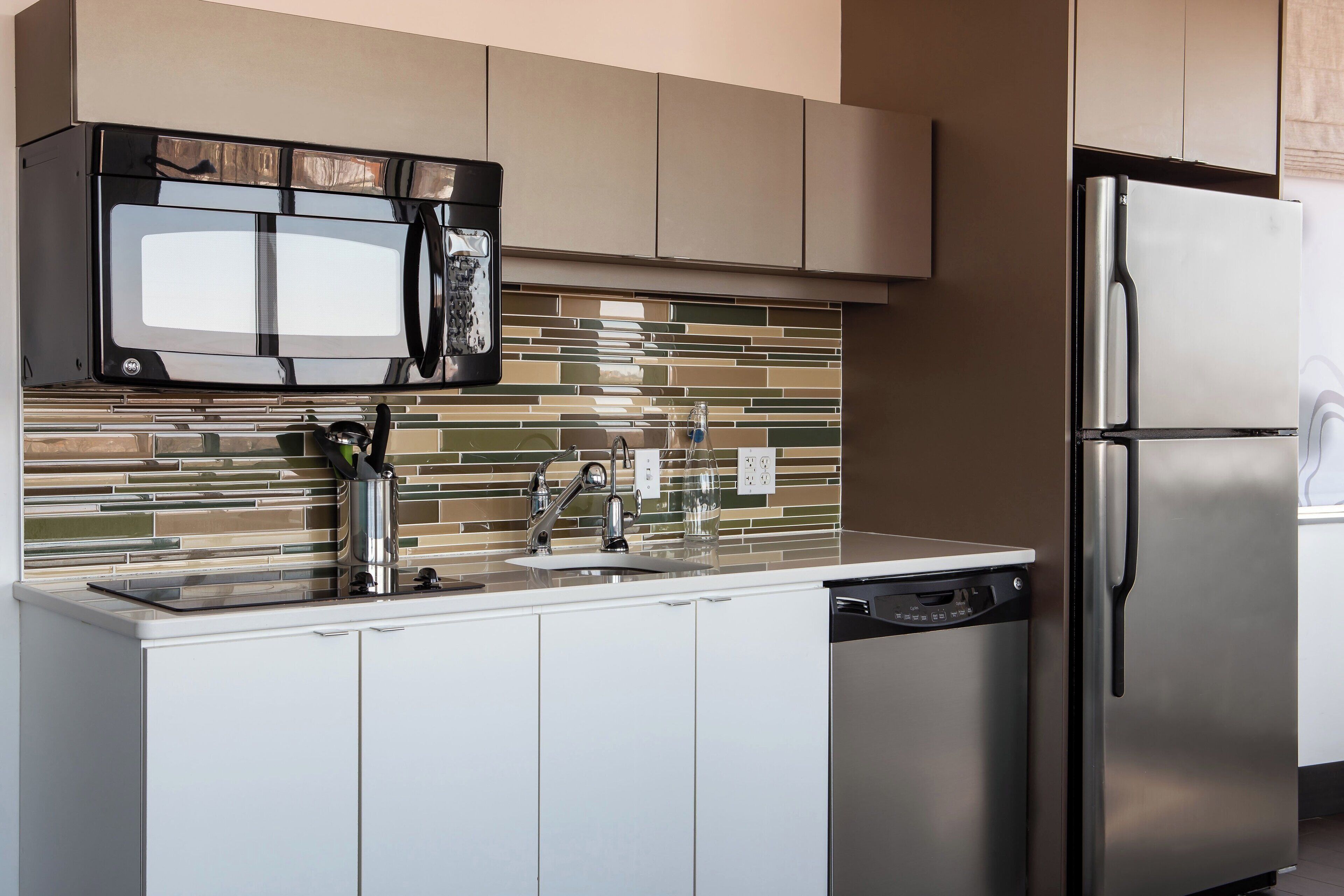 executive suite, 1 king bed with sofa bed | private kitchen | full-sized fridge, microwave, stovetop, coffee/tea maker