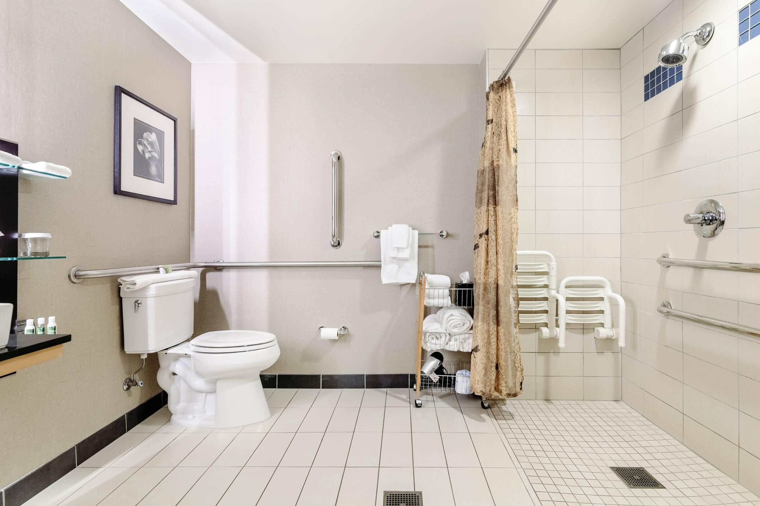 suite, 2 queen beds, accessible, non smoking | bathroom | hair dryer, towels, soap, shampoo