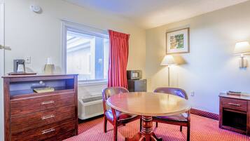 Suite, 1 Queen Bed, Jetted Tub | Blackout drapes, iron/ironing board, free WiFi, bed sheets