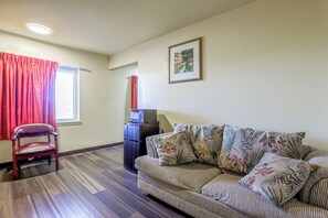 Suite, 1 King Bed with Sofa bed, Non Smoking | Blackout drapes, iron/ironing board, cribs/infant beds, free WiFi