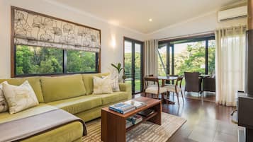 Télévision LED, lecteur de DVD, station d'accueil iPod, films à la carte