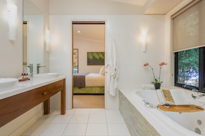 Deluxe Room, Multiple Beds | Bathroom | Designer toiletries, hair dryer, bathrobes, slippers