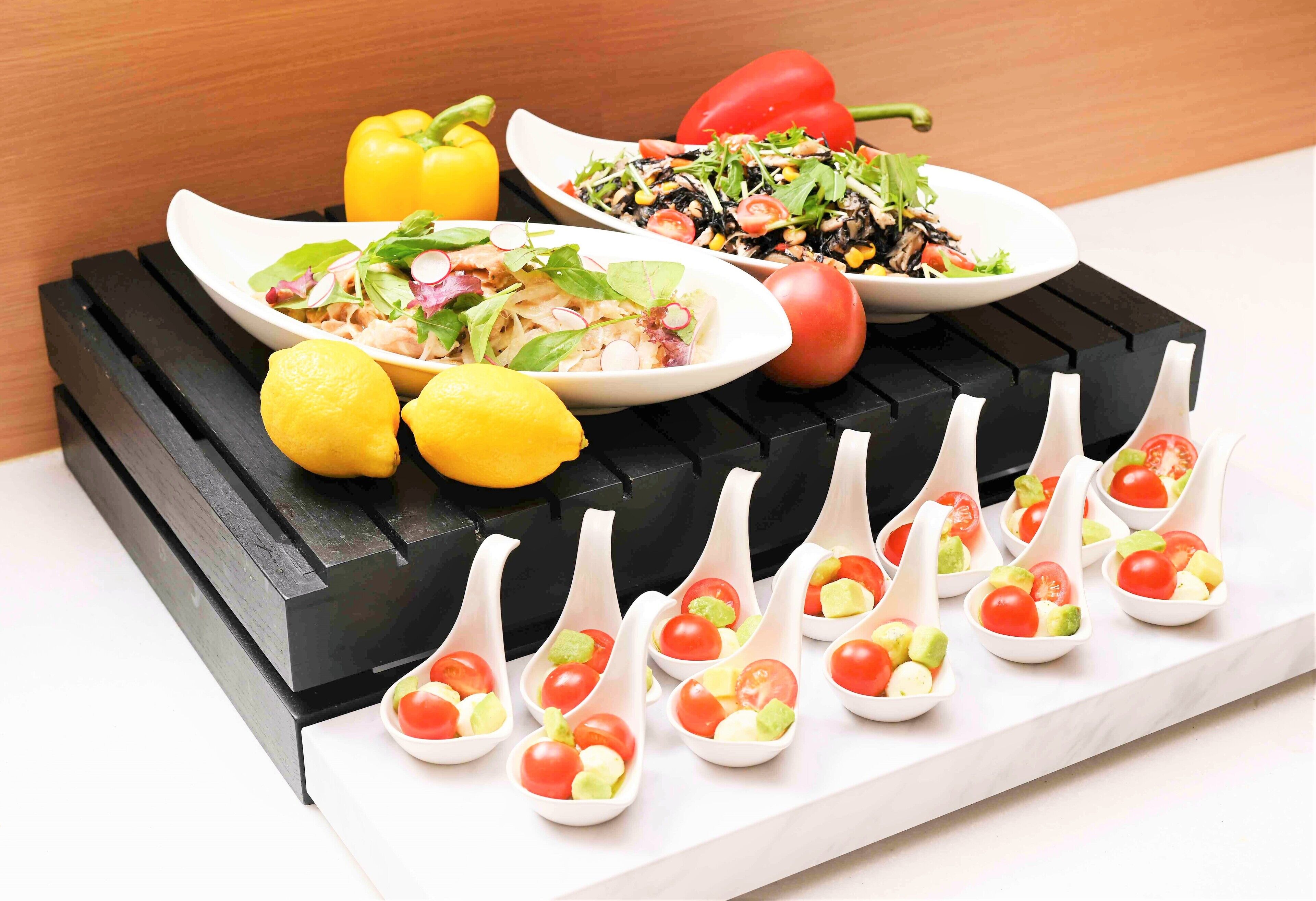 A kitchen counter with various food items and utensils.