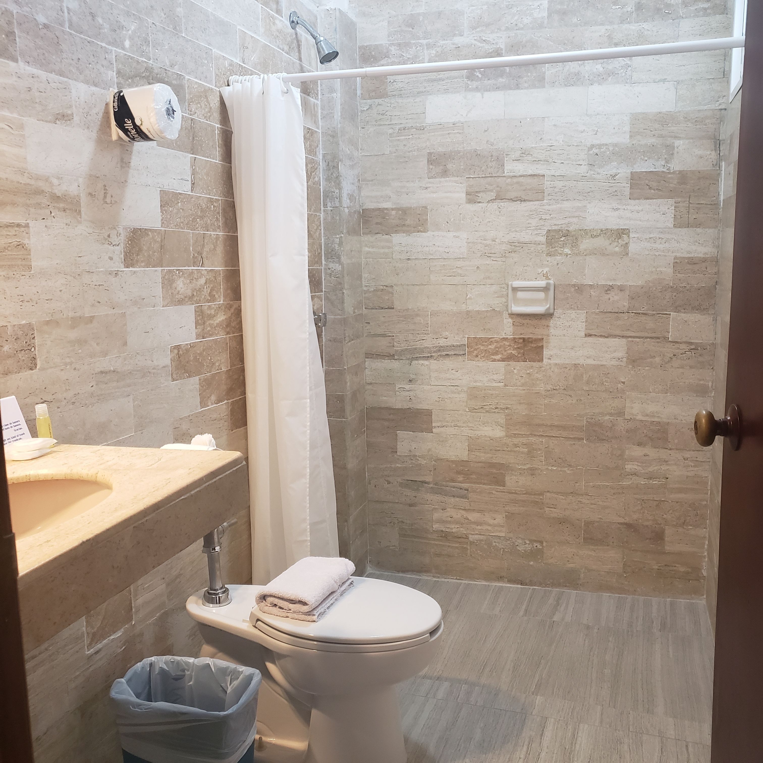 shower, hair dryer, bathrobes, towels