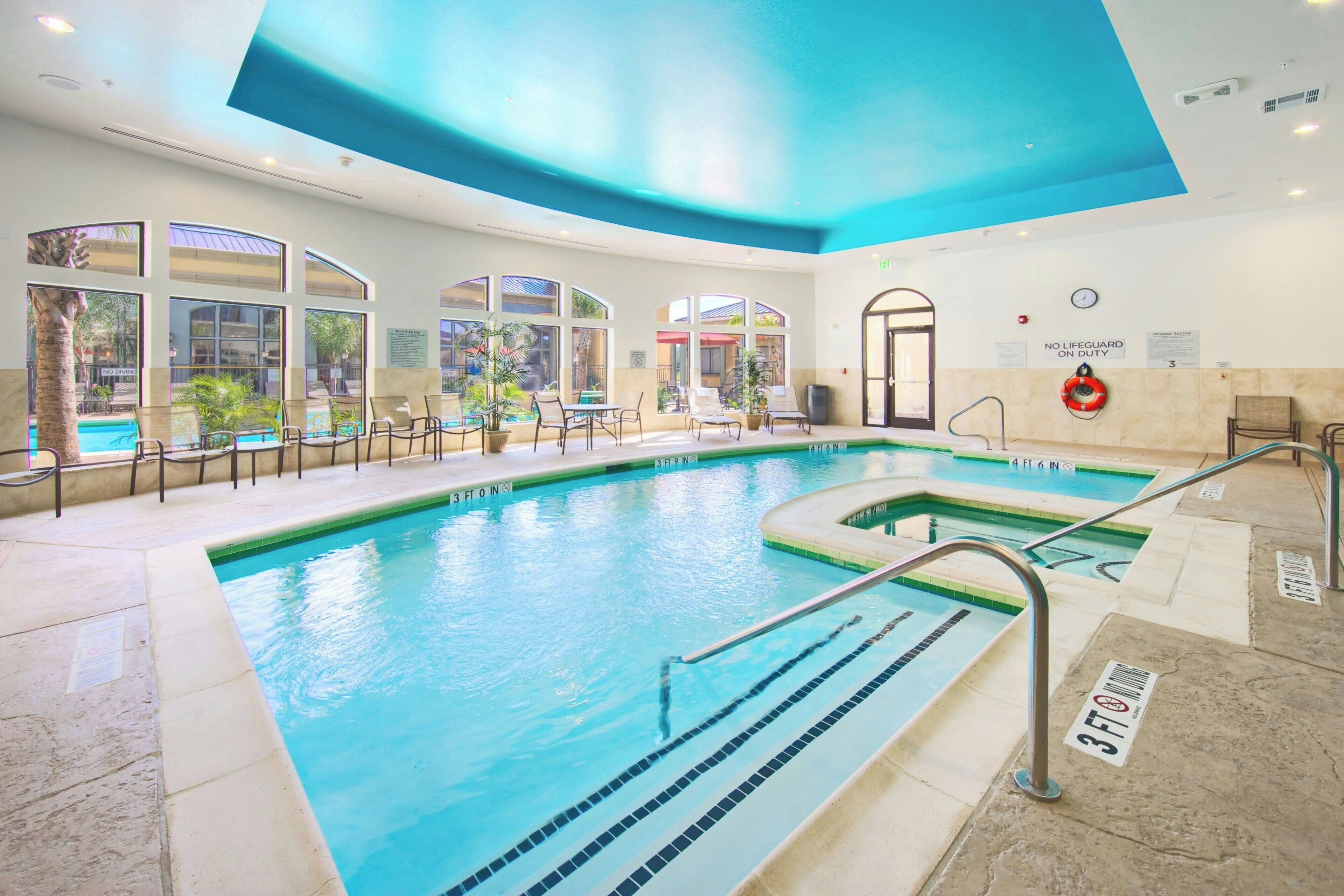 Indoor pool, outdoor pool, open 9:00 AM to 9:00 PM, pool umbrellas