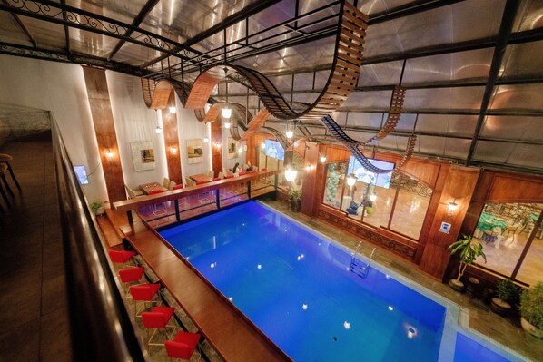 Indoor pool, open 8 AM to 8 PM, pool loungers