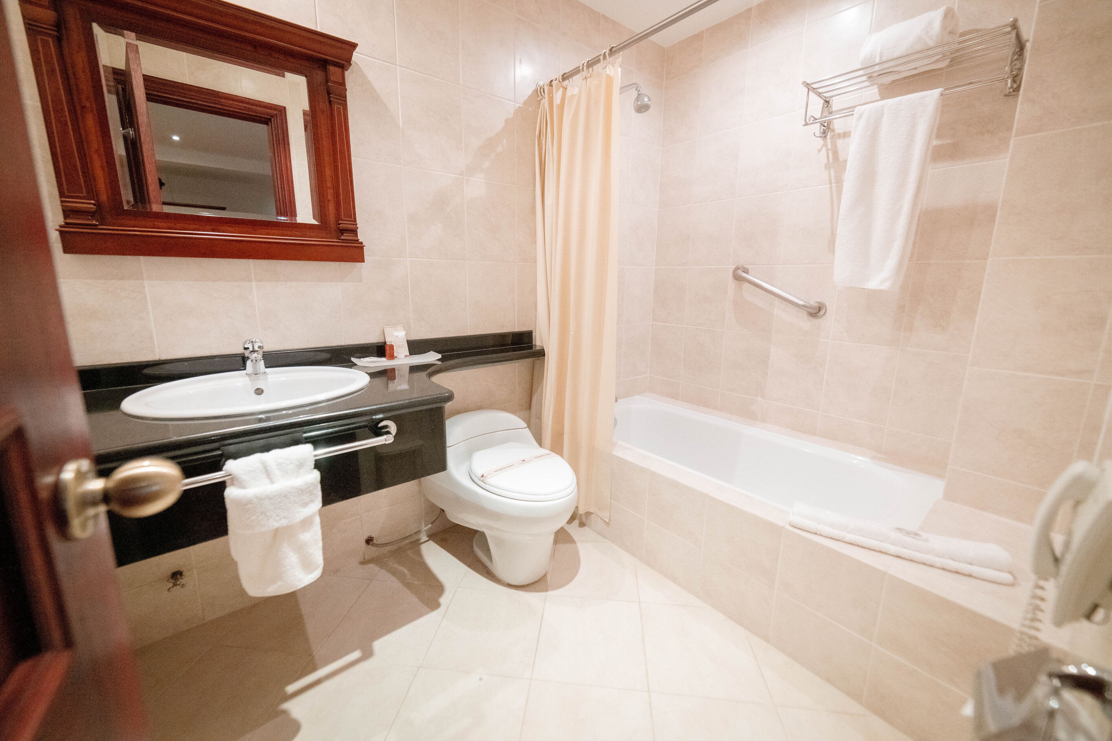 separate bathtub and shower, deep-soaking bathtub, free toiletries
