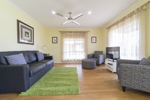 Cottage, 2 Bedrooms | Living area | LCD TV, DVD player, iPod dock