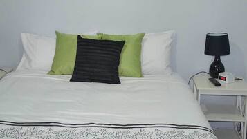 Desk, blackout drapes, iron/ironing board, cribs/infant beds