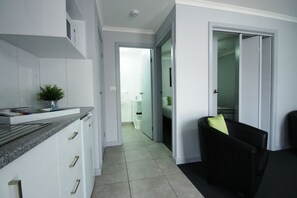 Villa Unit | Private kitchen | Fridge, microwave, coffee/tea maker, electric kettle