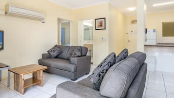 Standard Apartment, 2 Bedrooms | Living area | Flat-screen TV