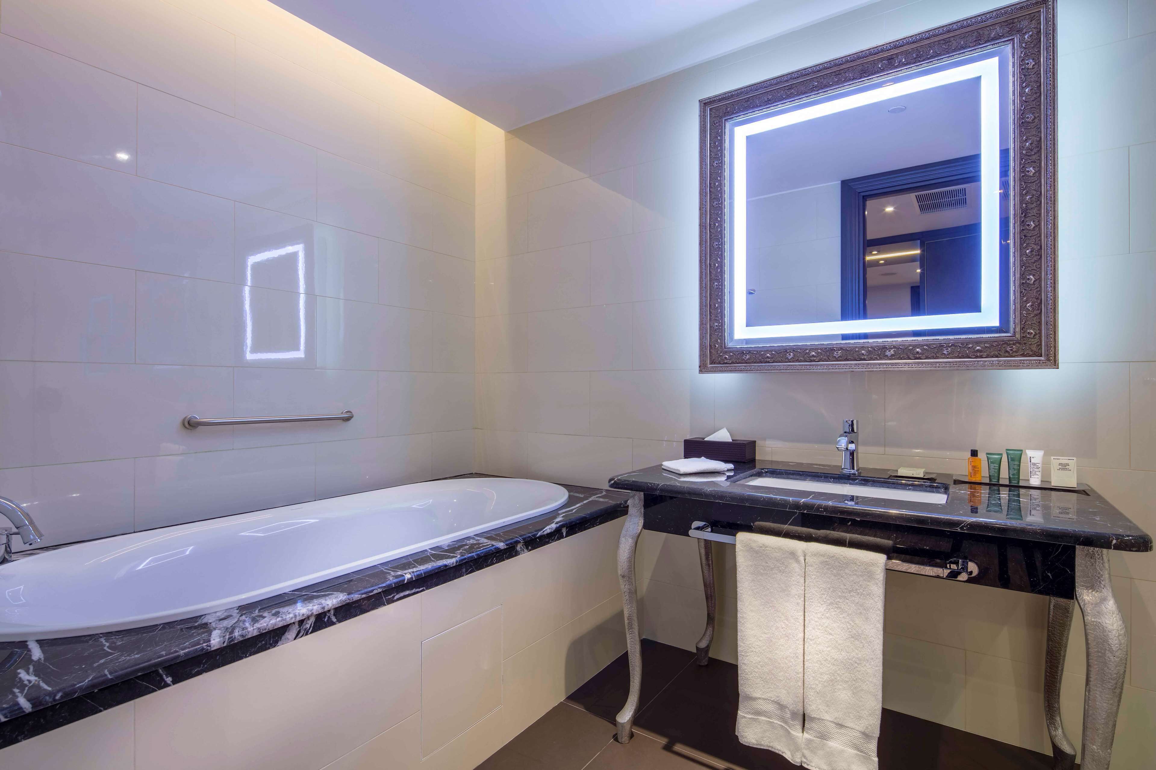 room, 1 king bed, park view | bathroom | hair dryer, slippers, towels