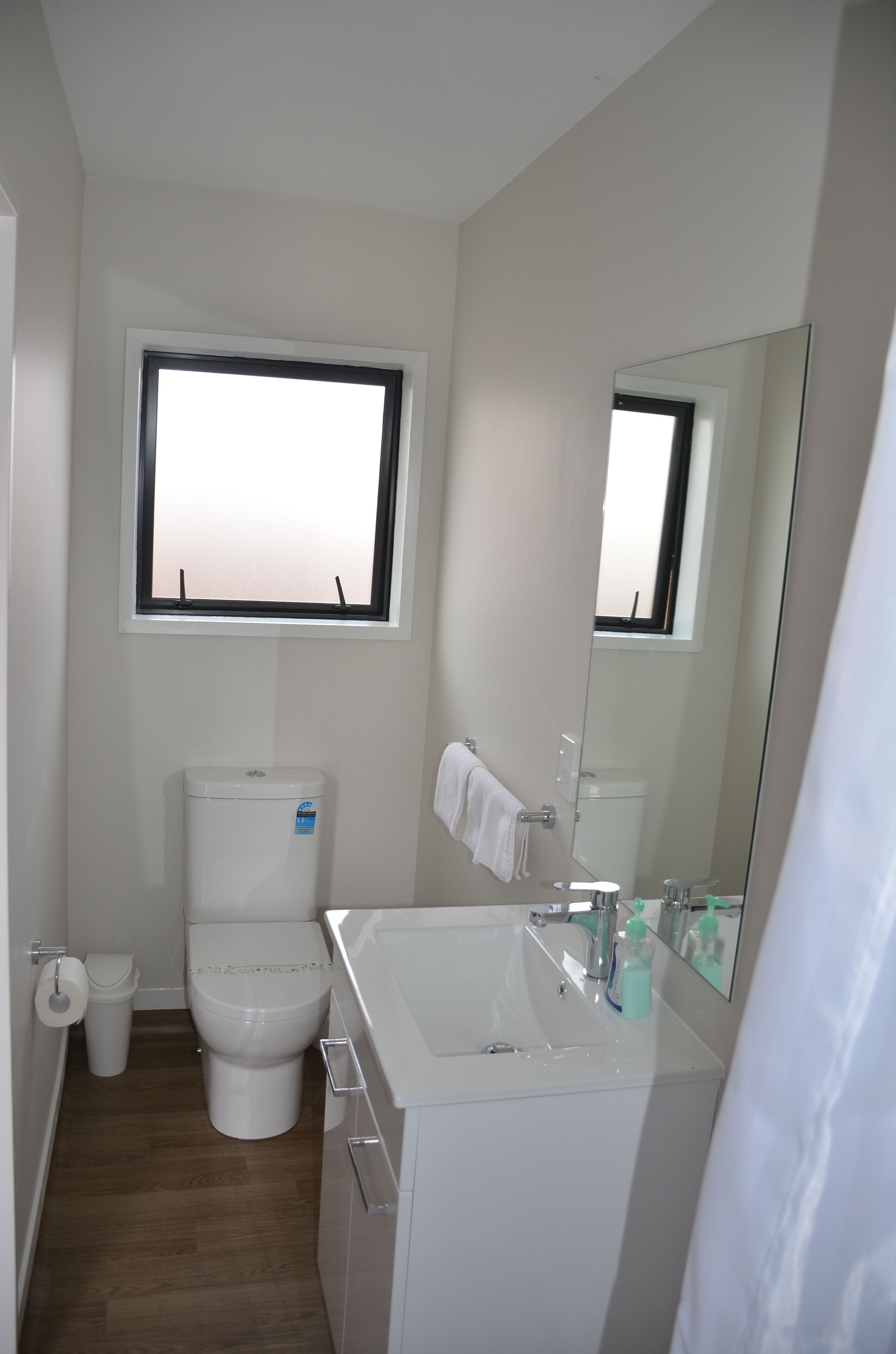Bathroom | Shower, rainfall showerhead, hair dryer, towels