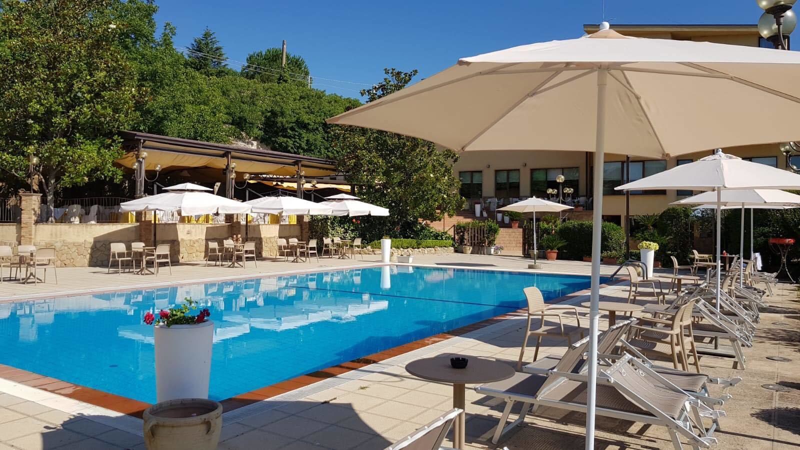 Seasonal outdoor pool, pool umbrellas, sun loungers