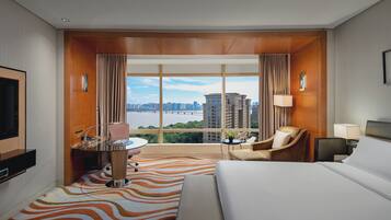Premium Room, 1 King Bed, City View | Minibar, in-room safe, laptop workspace, blackout curtains