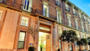 A multi-story building with a prominent entrance labeled "PALACIO DE TEPA". - NH Collection Palacio de Tepa (Madrid)