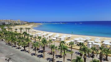 On the beach, sun-loungers, scuba diving
