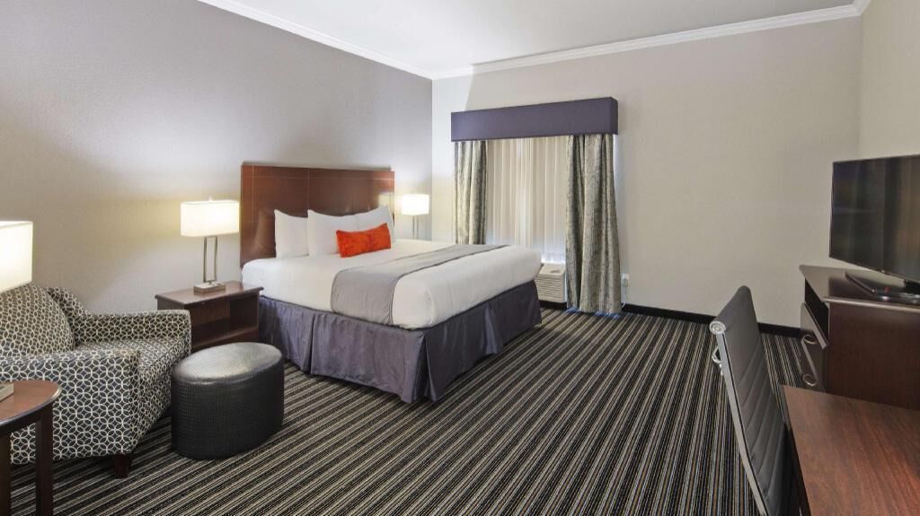 Premium bedding, pillow-top beds, desk, blackout curtains