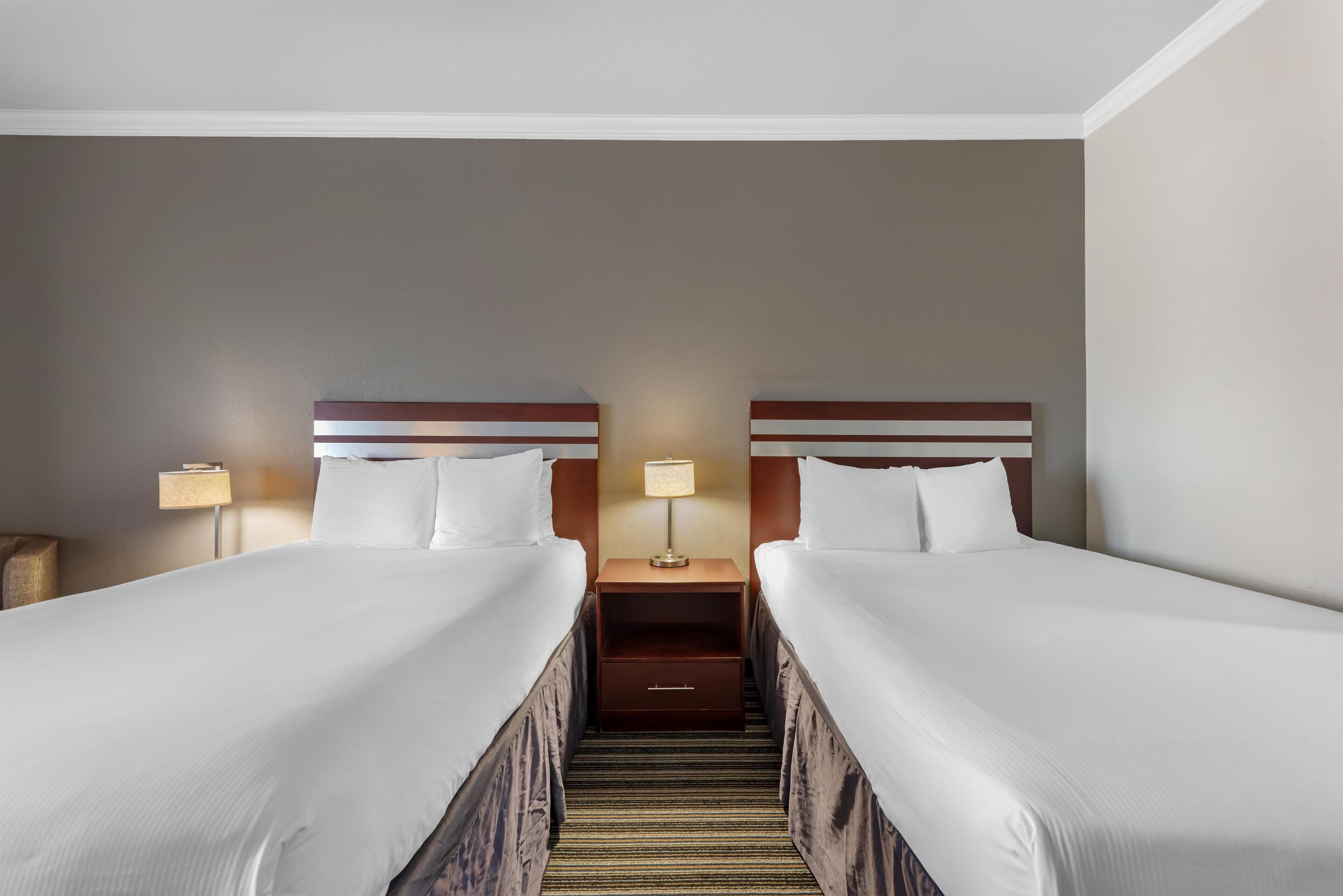 Premium bedding, pillowtop beds, desk, blackout drapes