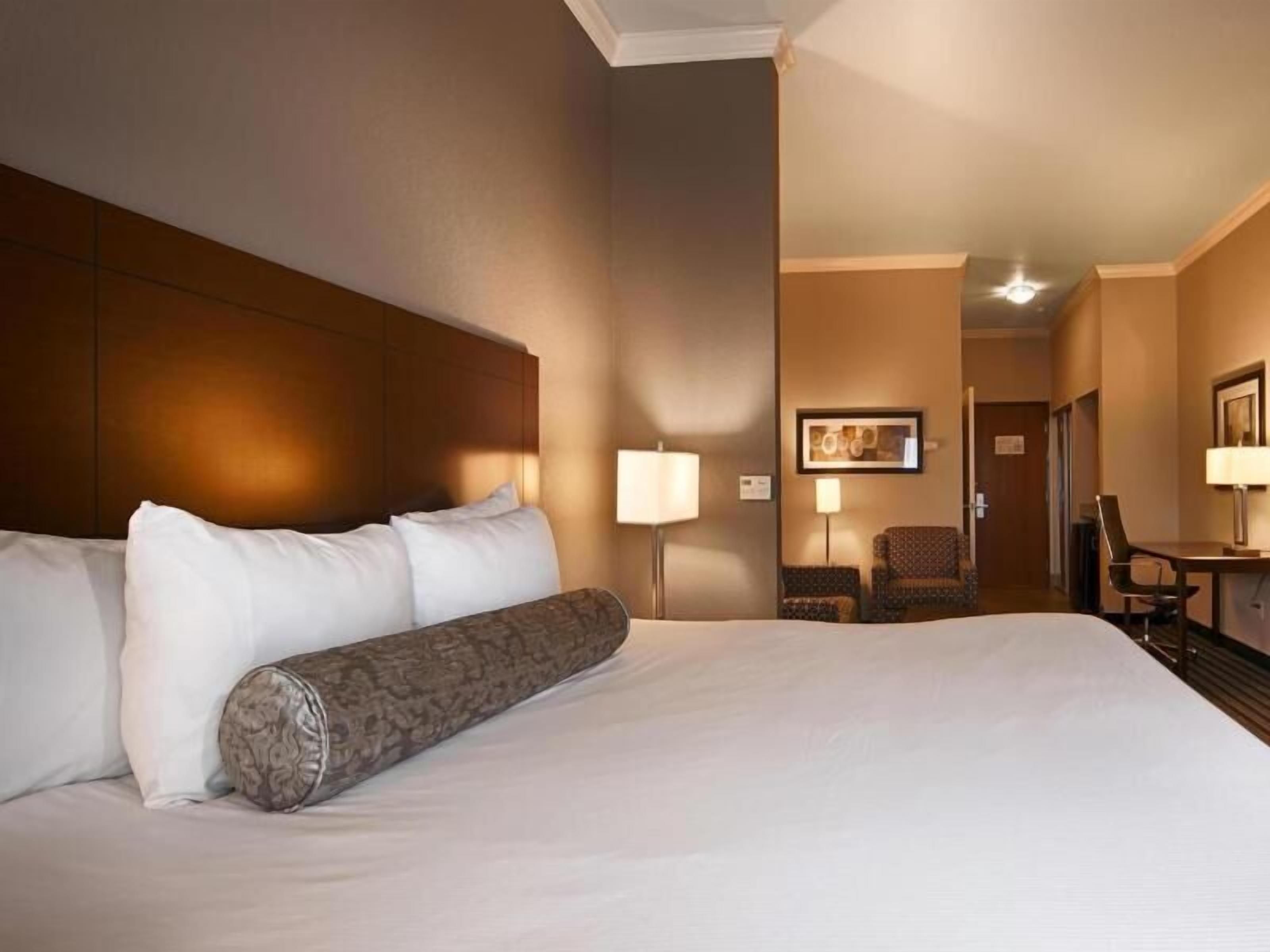 Premium bedding, pillow-top beds, desk, blackout curtains