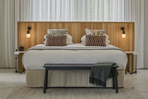 Deluxe Cottage, Garden View | Premium bedding, minibar, in-room safe, individually decorated