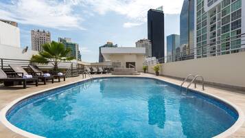 Outdoor pool, pool umbrellas, pool loungers
