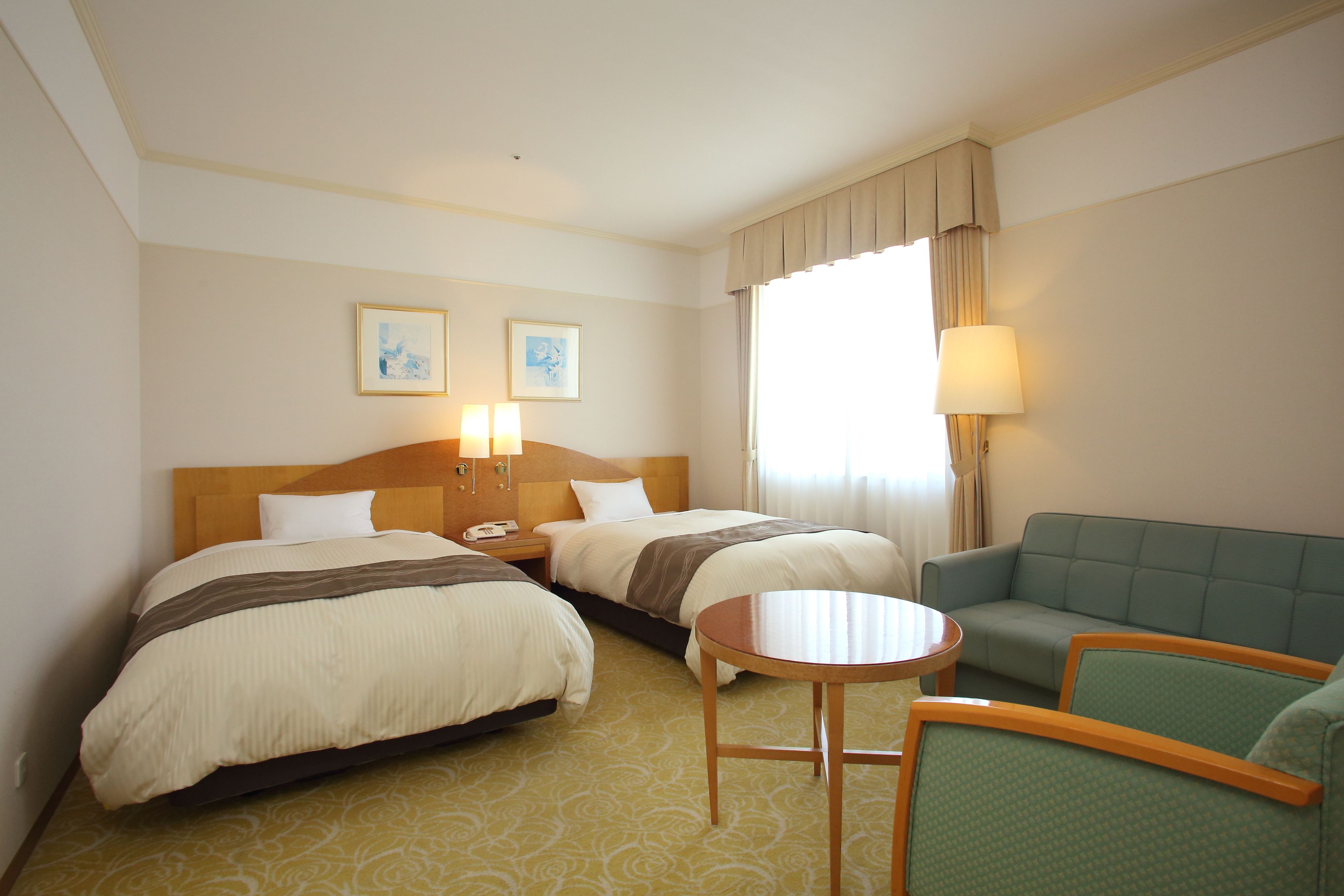 standard twin room | in-room safe, desk, blackout curtains, soundproofing