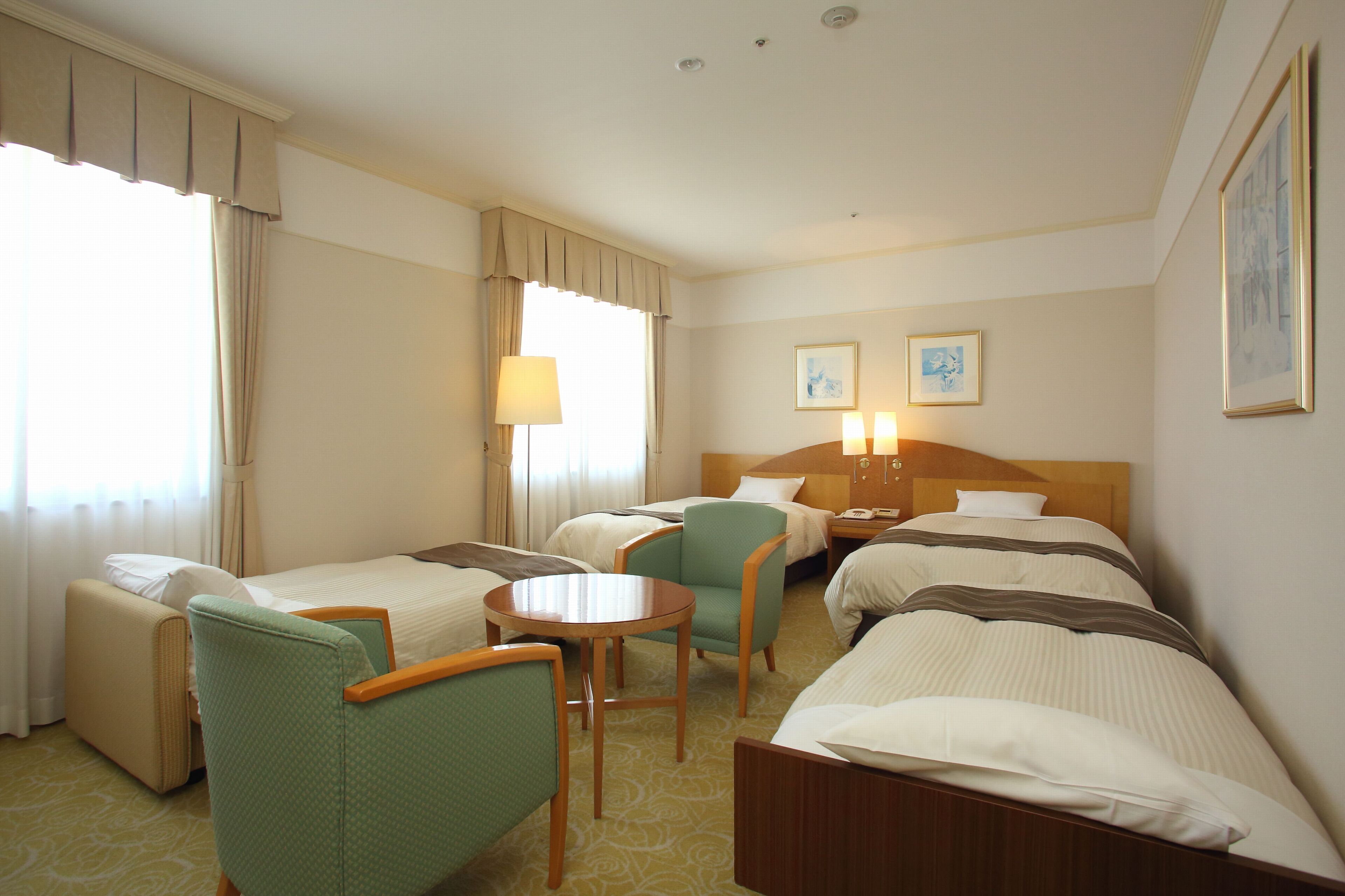 quadruple room | in-room safe, desk, blackout curtains, soundproofing