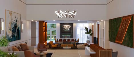 A modern interior with a central seating area, a reception desk, and a large abstract painting on the wall.