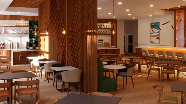 A modern restaurant with wooden accents, multiple seating areas, and a bar. - DoubleTree by Hilton Houston Westchase (Houston)