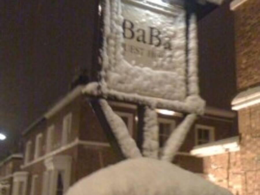 A cat tree with the text "BaBa" and "BEST HAIR" on it.