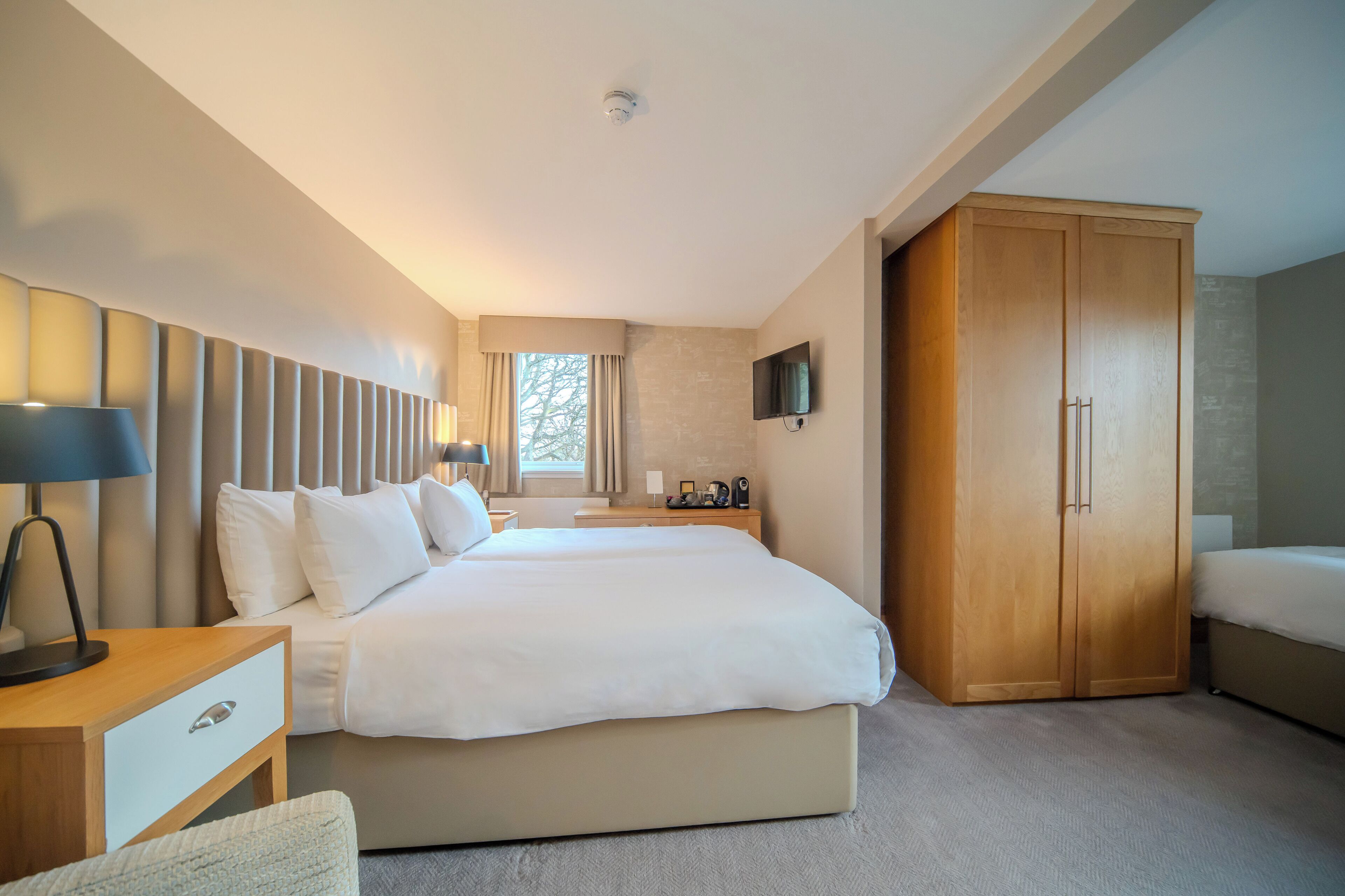 family room | in-room safe, desk, laptop workspace, iron/ironing board