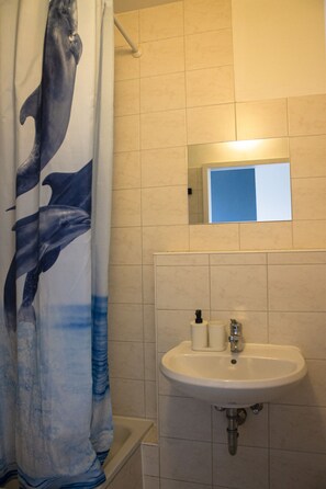 Triple Room | Bathroom | Shower, hair dryer, towels