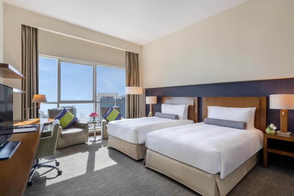 Premium bedding, down comforters, pillowtop beds, in-room safe