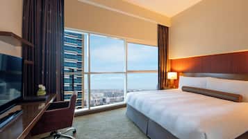 Premium bedding, down duvets, pillow-top beds, in-room safe