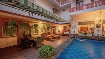 Outdoor pool, sun loungers