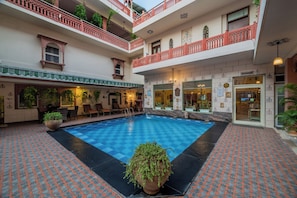 Outdoor pool, sun loungers
