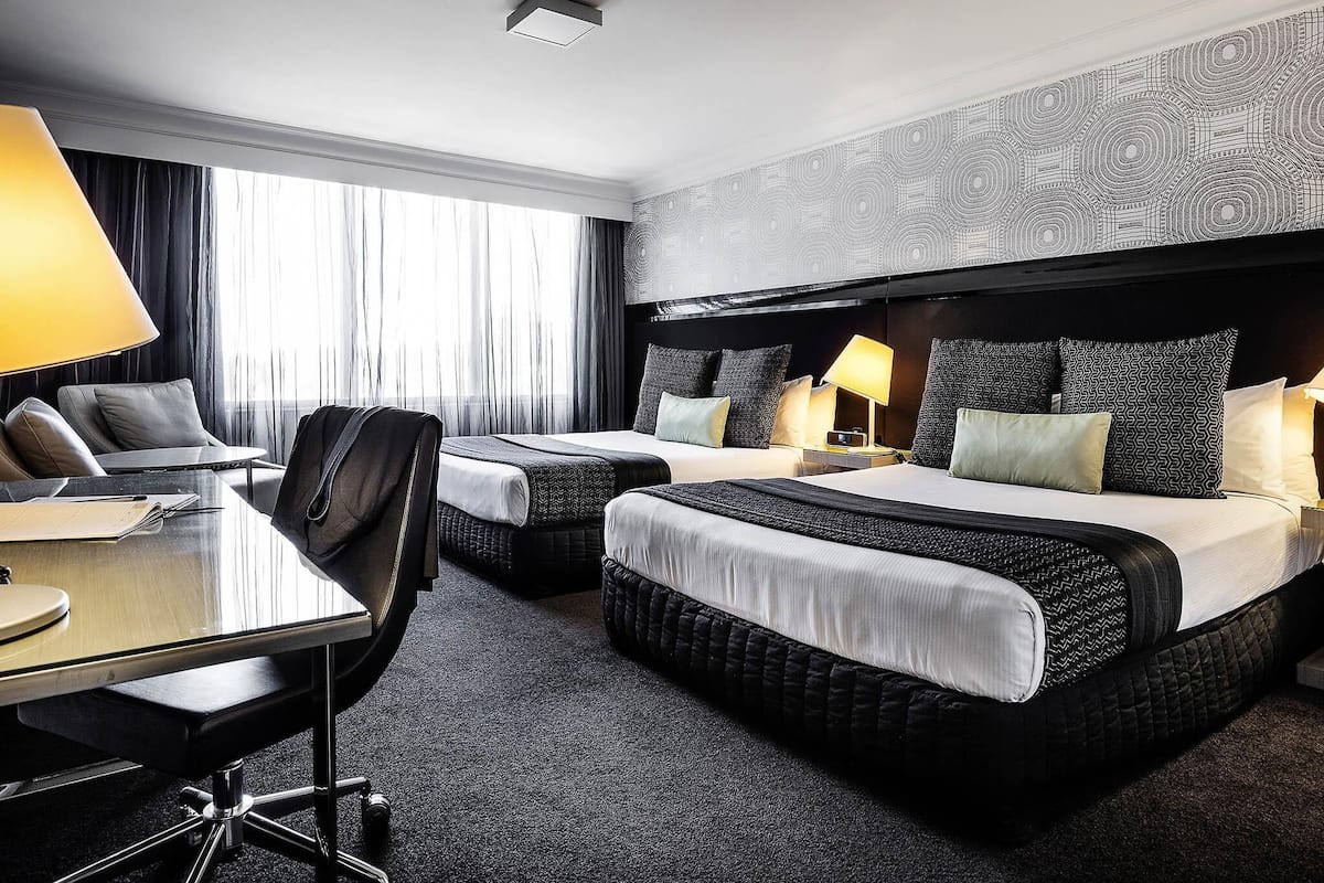 Deluxe Twin Room, 2 Twin Beds | In-room safe, desk, laptop workspace, blackout drapes