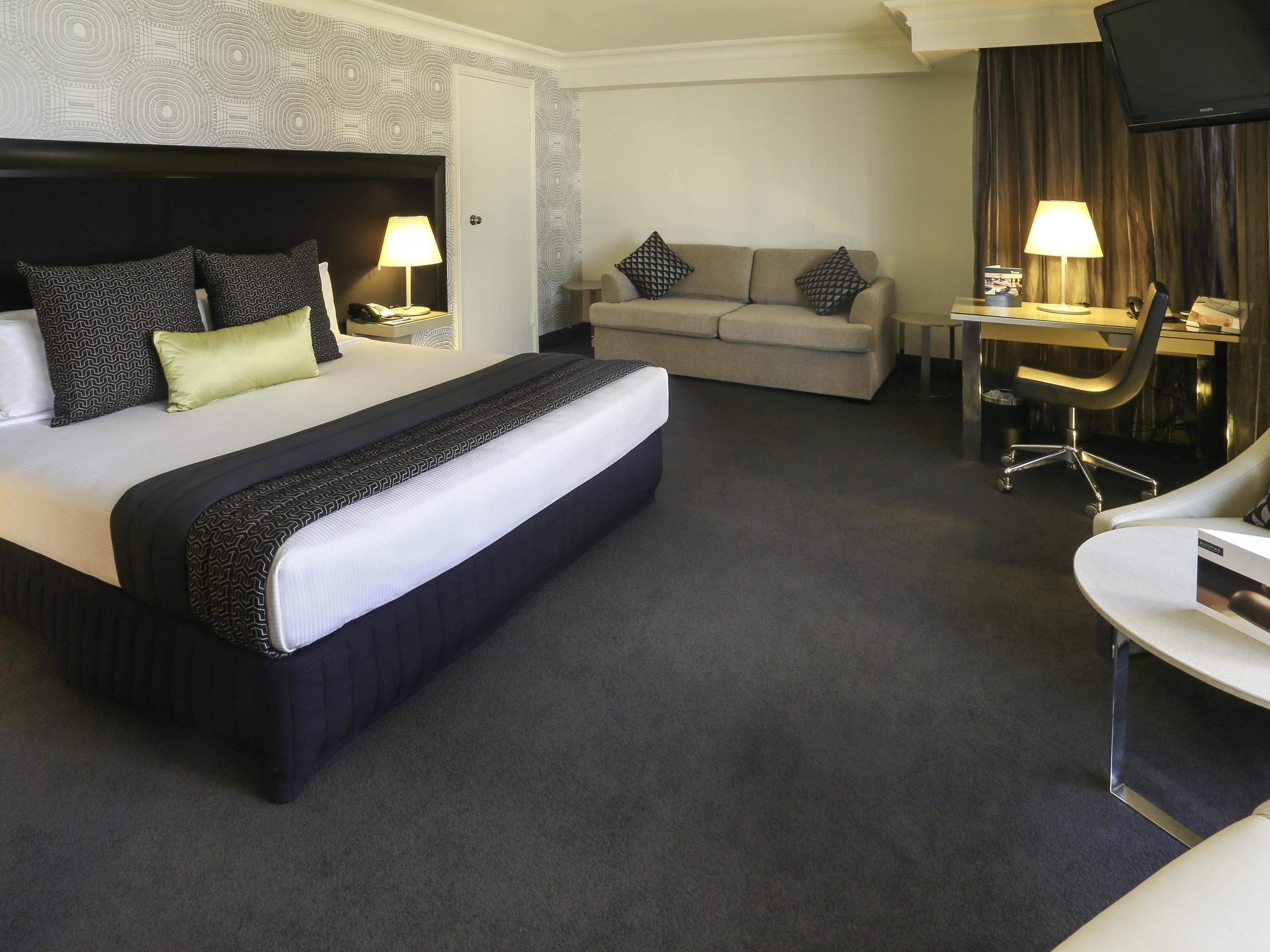 Premium Room, 1 King Bed, Corner | In-room safe, desk, laptop workspace, blackout drapes