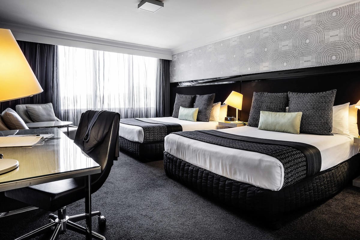 Deluxe Twin Room, 2 Twin Beds | In-room safe, desk, laptop workspace, blackout drapes