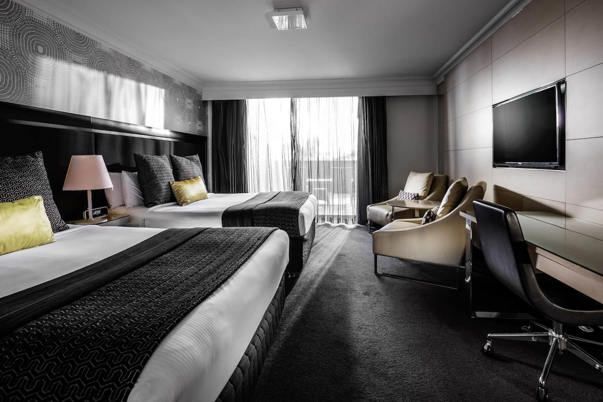 Deluxe Twin Room, 2 Twin Beds, Balcony | In-room safe, desk, laptop workspace, blackout drapes